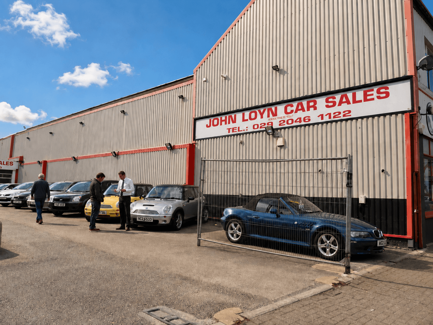 John Loyn Car Sales forecourt and sign